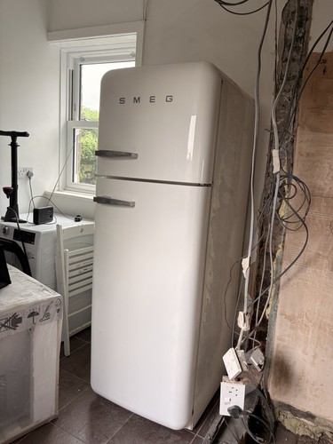 Smeg fridge freezer right - fridge, hand